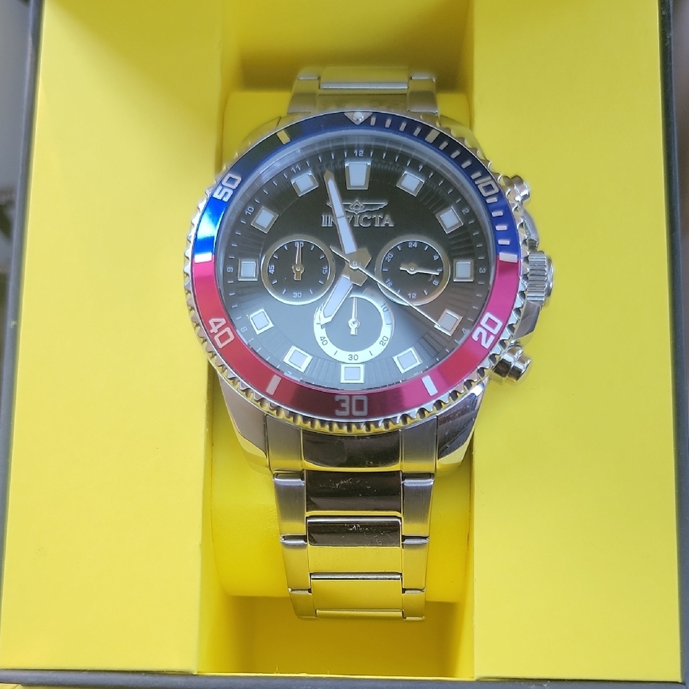 Invicta Silver Watch with Red and Blue Bezel